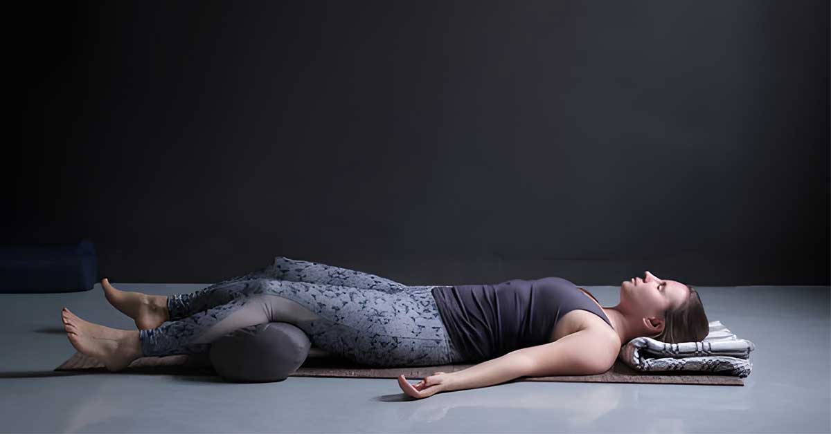 Corpse Pose with Bolster (Savasana) Corpse Pose with Bolster (Savasana)