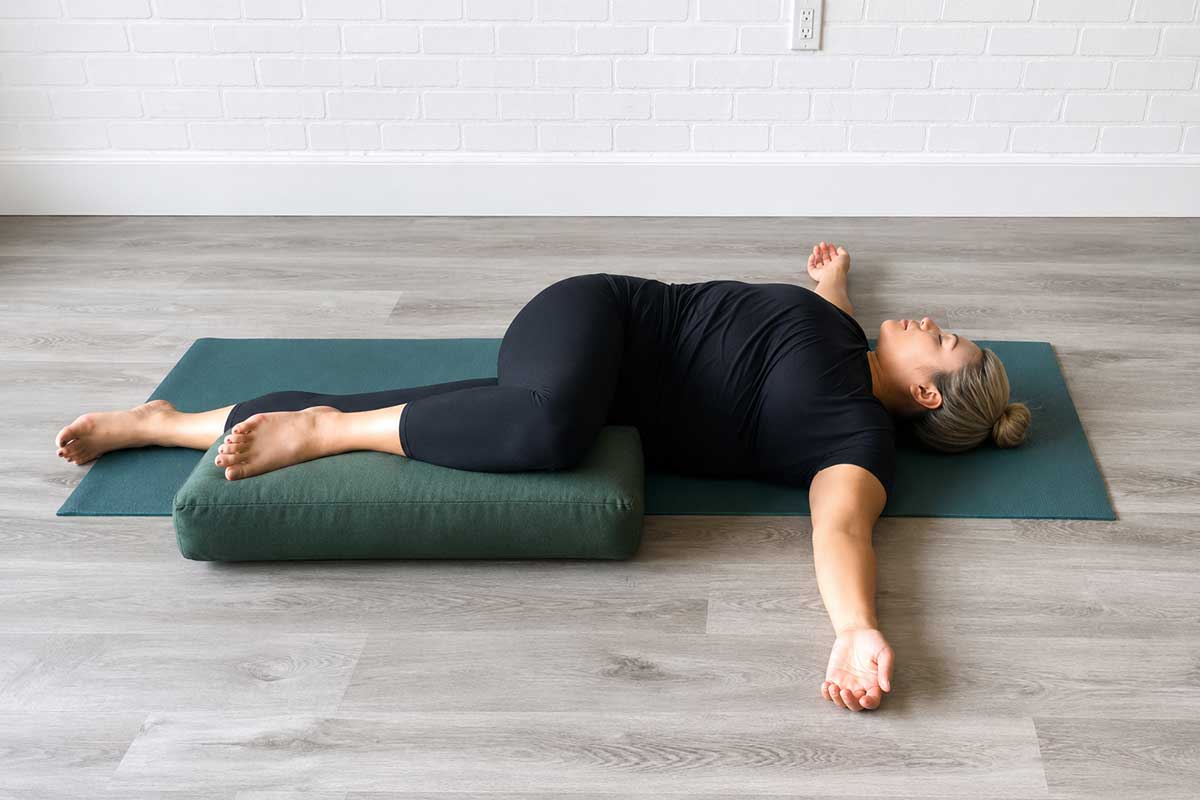 Supported supine spinal twist (supta matsyendrasana) Supported supine spinal twist (supta matsyendrasana)